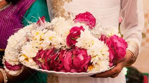 Gorgeous bride, groom kissing and hugging near the cliffs with stunning views. Flowers On Plate During Garland Ceremony In Indian Wedding Stock Photo Picture And Royalty Free Image Image 138108652