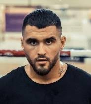 DARREN BARKER STOPS SIMONE ROTOLO