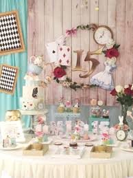 Alice In Wonderland Quinceanera In 2020 Wonderland Party Decorations Alice In Wonderland Decorations Quinceanera Themes