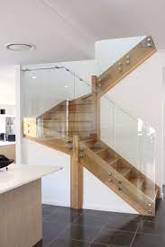 Frameless Glass Staircase Balustrade With Custom Made Stainless Steel Handrails And Standoffs Glass Balustrade Stainless Steel Handrail Handrails