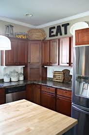 No ones ceiling is usually level enough to not use moldings. Kitchen Cabinets That Dont Go To The Ceiling Trendy Kitchen Tile Kitchen Renovation Kitchen Cabinets