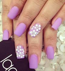 Lilac Matte Purple Nails With White Flowers Lilac Nails Coffin Nails Designs Flower Nails Purple nail art purple nail designs pretty nail art colorful nail designs beautiful nail art purple nails with design nails design fingernail designs nail polish designs.