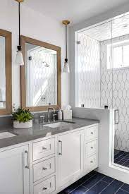 Combining different patterns and textures is one key element in coastal design. Stunning Modern Coastal Home With Inspiring Details In Corona Del Mar Bathroom Interior Design Bathrooms Remodel Bathroom Interior