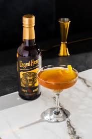Caged Heat - Absinthia's Bottled Spirits