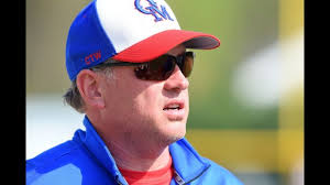 Baseball: Spalding slugs its way to a pair of wins