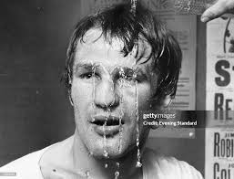 Boxer Bobby Arthur with water running down his face from a water... News  Photo