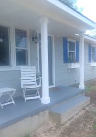 The colors easily match its classic architecture and help to complement the various elements such as the columns on the porch. Beach House Exterior Color Scheme