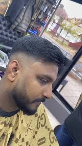 R A Barber (@william.rwandzy)