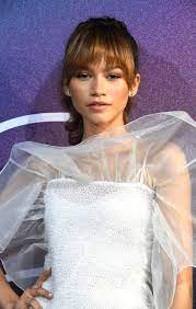 Getty images a perfect addition to long hair with minimal layers, dakota johnson's bangs go across her forehead, but also frame the sides of her face. Best Fringe Hairstyles For 2021 Celebrity Hairstyle Inspiration