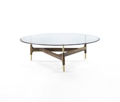 This elegant, contemporary table combines a beautifully carved infinity base in solid canaletta walnut or frassino ash with a top in 10mm tempered glass. Joint 120 Coffee Tables From Porada Architonic
