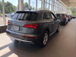 Rear Angled View Of The 2018 Audi Q5 In Monsoon Grey Metallic Vehicle Available At Audi Of Bridgewater Nj Audi Dealership Audi Audi Q5