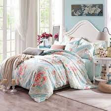 The teal accent provides a second layer of depth. Celeste Green And Peach Pink Rustic Flower Print And Bohemian Tribal Pattern Abstract Design 100 Tencel Full Queen Size Bedding Sets Enjoybedding Com