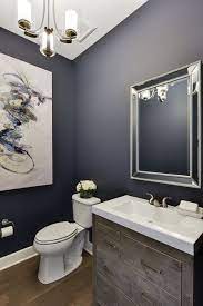 Find fresh inspiration for your bathroom with our favorite color schemes, decor, light fixtures, mirrors, tile and more. Bathroom Ideas Bathroom Design Small Bathroom Ideas Dark Color Bathroom Design Blue Powder Rooms Bathroom Paint Colors Navy Blue Walls