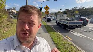 Oteha valley road speed bump. , In a 60 zone at a traffic light. 🤷🏻‍♂️ ,  It’s like living in a nightmare