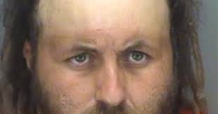 Man charged with racing