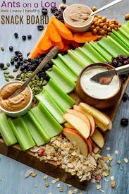 Ants On A Log Kids Snacks Platter An Easy Healthy Snack Idea Based On The Classic Combo Of Celery Peanut Butter And Ra Veggie Snacks Snacks Healthy Snacks
