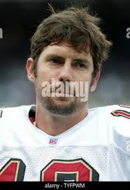 San Francisco 49ers quarterback Tim Rattay passes in front of Atlanta  Falcons linebacker Chris Draft during the 49ers 21-19 loss to the Falcons,  Sunday, Sept. 12, 2004. The 49ers quarterback Ken Dorsey