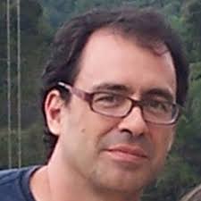 Has anyone used NO2 during bake-out of a stainless-steel ultra-high-vacuum  system to improve the final vacuum?