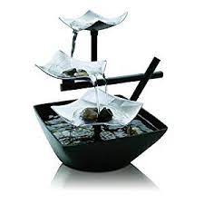 This one is a thing of elegant beauty, especially the water flowing from the blooming flower on the lap of the buddha statue. Tabletop Water Fountains Indoor Water Fountains