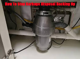 garbage disposal backing up into sink
