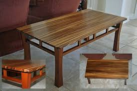 This jonathan franc cocktail table has an oval zebra wood inset top with a 3 clear acrylic border around it. Zebrawood Table Finewoodworking