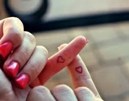 Her pinky finger says swear to symbolize making a pinky swear, which is when you link pinkies with someone while making a promise so that you both know. Pinky Swear Tattoo Tattoo Gallery Collection