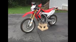 Our favorite motorcycle lift table is made mainly out of wood, but it doesn't feature the same mechanical action as a professional lift table. Labelle Wooden Dirtbike Stand Youtube