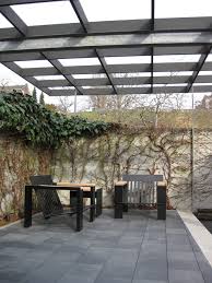 This pergola alternative looks modern and works great to provide shade, although it's not well suited to offer much protection from wind or heavy rain. Modern Pergola Inspiration For Your Backyard Oasis Insteading