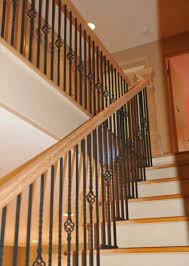 Pin By Catie Anderson On Our Basement Remodel Oak Stairs Staircase Makeover Wrought Iron Stair Railing