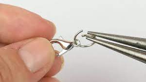 Split rings are like minature keyrings that are perfect for attaching charms at home. 3 Ways To Add Charms To A Charm Bracelet Wikihow
