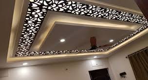 In the dining room inside, a false ceiling has been inserted above the round table. Rohit Interiors Homify Interior Ceiling Design House Ceiling Design Ceiling Design