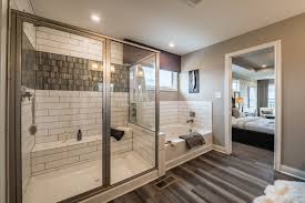 Elongated Subway Tile Gives The Master Bathroom In This New Home A Classic Look Tailor The Selections T Master Suite Remodel Bathroom Remodel Master New Homes