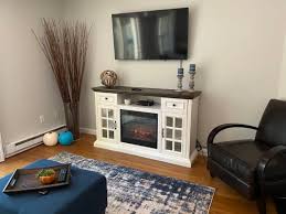 But to make your task easier, we've put together this list of the 10 most realistic electric fireplace tv stands — carefully selected after being reviewed based on size, log and flame simulation, aesthetic appeal, and other important criteria. 60 White Brown Electric Fireplace Console Big Lots