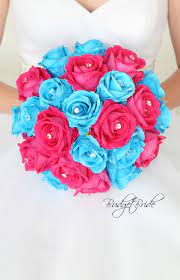 This beautiful spring wedding took place at the historic santa margarita ranch on california's central coast. Davids Bridal Malibu Blue Wedding Bouquet Hot Pink Roses Bouquet Diamond Pins Theme Ideas Turquo Pink Wedding Decorations Blue Themed Wedding Turquoise Wedding