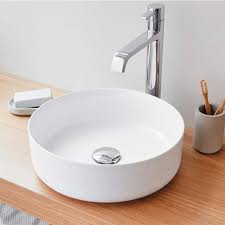 Sélection design et moderne de vasque à poser en pierre, céramique et composite de chez rue du bain. Vasque A Poser Ronde En Ceramique Marsala Blanc Mat 35 5 Cm Le Monde Du Bain