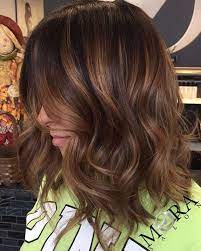 Easy daily layered shoulder length hairstyle. 60 Looks With Caramel Highlights On Brown And Dark Brown Hair Hair Highlights Brown Hair With Caramel Highlights Dark Hair With Highlights
