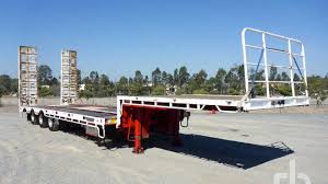 Step deck trailers offer three main advantages that standard flat bed trailers cannot: Drop Deck Step Deck Trailers For Sale Ritchie Bros Auctioneers