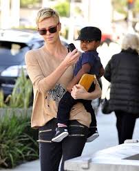 Charlize Theron And Her Son Who She Adopted From Her Native South Africa Celebrity Parents Infant Adoption Sons Charlize Theron
