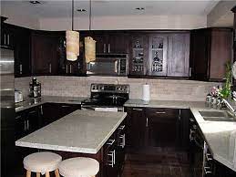 Maybe you would like to learn more about one of these? Espresso Kitchen Love The Combination Of Dark Cabinets And White Granite Espresso Kitchen Cabinets Espresso Kitchen Espresso Cabinets