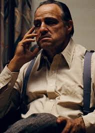 Marlon brando , who plays the godfather as a shrewd, unbreakable old man, actually has the character lead in the movie; The Godfather Marlon Brando Gangster Movies Godfather Movie