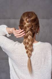 Once the braid is secured, pancake it by step 5: How To Dutch Braid Your Own Hair Easy Dutch Braid Tutorial