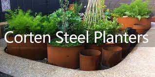 Manufactured in either plain or with decorative patterns from 1.5mm thick corten steel, laser cut, folded, welded and dressed. Tall Corten Steel Metal Planters For Outdoors Big Sizes Long Life Span