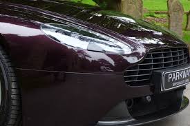 Image result for Amethyst Red 2012 Aston Martin
