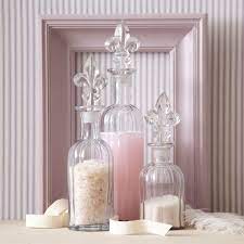 Clear glass square ribbed jars with metal lids, 4x4x4.25 in., square lattice clear glass jars with metal fill it with things like small office stationary, dry kitchen goods like spices, decorative sand or stones, water, and much more. Fleur De Lis Decorative Bottles These Pretty Glass Decorative Bottles With Fleur De Lis Designed Li Glass Decor Glass Bottles Decoration Shabby Chic Bathroom