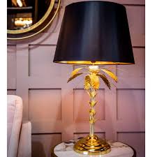 Only 2 available and it's in 3 people's carts. Gold Palm Tree Table Lamp Culinary Concepts
