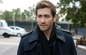 Jake has a navy blue suit with a dark green shirt underneath. Jake Gyllenhaal Biography Height Life Story Super Stars Bio