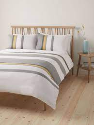 The comforter reverses to a solid light grey while the shams coordinate with sheets and pillowcases are printed with a light grey and white chevron design. John Lewis Partners Felix Duvet Cover Set Yellow Grey At John Lewis Partners