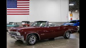 Image result for Regal Red 1965 Chevy II