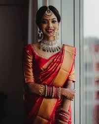 Marathi weddings bride wearing short sleeve blouse. 30 South Indian Blouse Designs For A Royal Bridal Look Shaadisaga