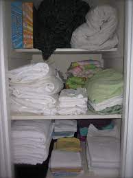 How To Organize Deep Shelves Deep Shelves Linen Closet Closet Shelves